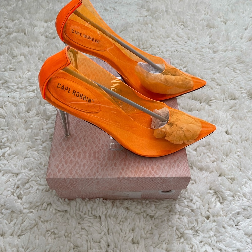 Orange PVC pump brand new never worn size 10